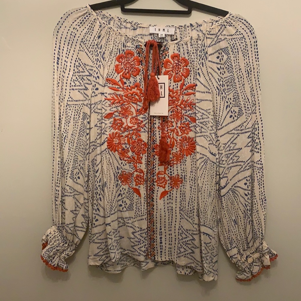 T H M L tassel tie embroidered top